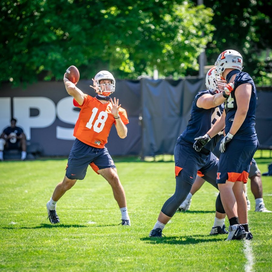 Senior quarterback Brandon Peters throws the ball to a receiver during practice on Aug. 7. 