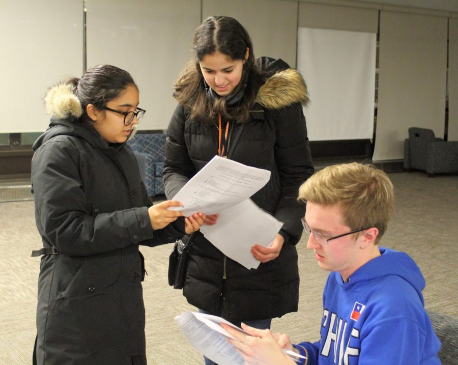A trio of biology students discuss a homework assignment in the main lounge of Allen Hall on March 9, 2019. University Housing plans to suspend and review the Multicultural Advocate position for the 2021-2022 school year. 