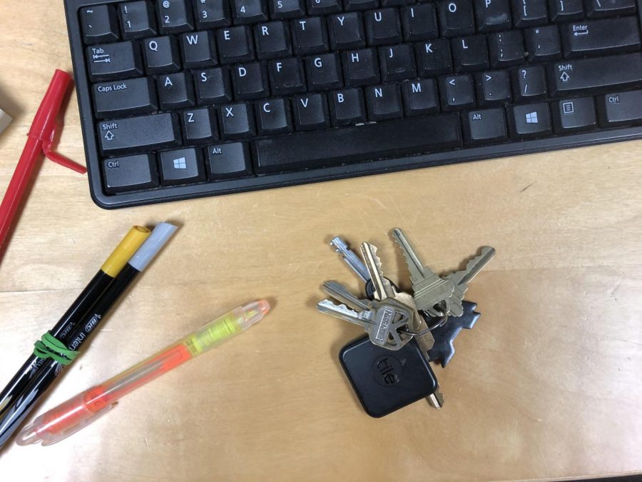 A set of forgotten keys sit on a desk. Some tips to remembering your keys include putting them on a lanyard, a necklace or even a hair tie.