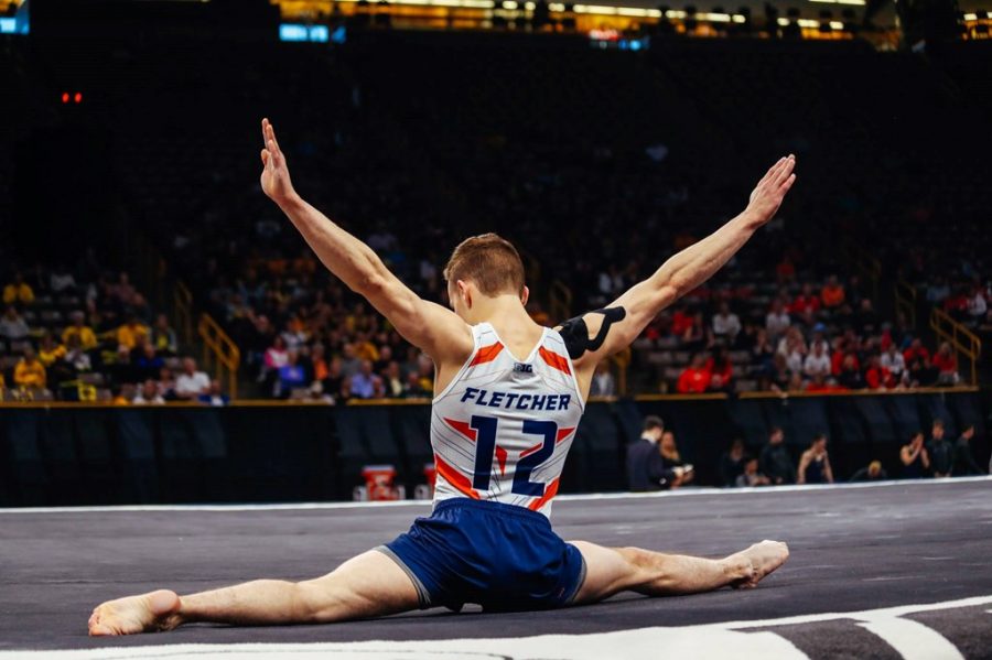 Redshirt junior Michael Fletcher performs the splits while competing at the Big Ten Championships on April 6, 2019. Fletcher and Clay Mason Stephens return to practice with the Illini after sustaining injuries.