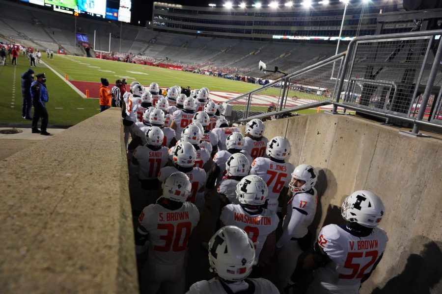 The Illinois football team enters Camp Randall Stadium in Madison, Wisconsin before the game against Wisconsin on Friday. The Illini lost the game 45-7.