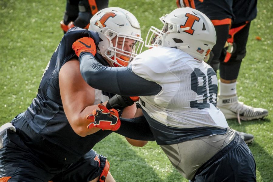 Senior defensive lineman Roderick Perry II blocks a teammate during practice on Oct. 12. Perry and Tarique Barnes were some of the only bright spots to come from Illinois’ loss to Wisconsin Friday night.