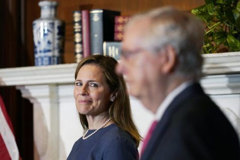 Seventh U.S. Circuit Court Judge Amy Coney Barrett, meets with Senate Majority Leader Mitch McConnell as she begins a series of meetings to prepare for her confirmation hearing on Sept. 29.