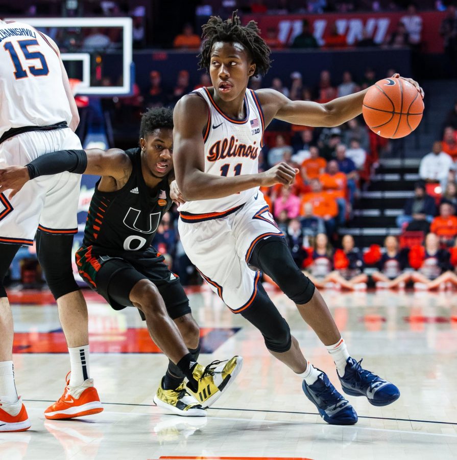 Illinois+guard+Ayo+Dosunmu+dribbles+past+a+University+of+Miami+defender+in+the+ACC%2FBig+Ten+Challenge+on+Dec.+2%2C+2019.+This+year%2C+the+Illini+are+reportedly+facing+Duke+in+the+ACC%2FBig+Ten+Challenge.+