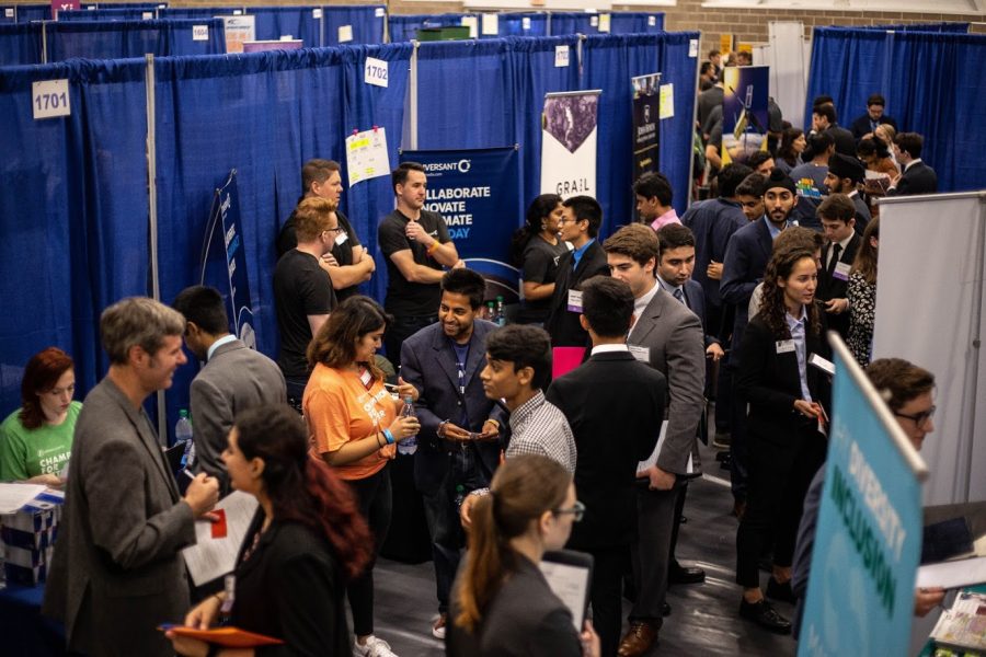 Illinois Engineering students speak with potential employers at the Engineering Career Fair at the ARC on Sept. 11, 2018. This year, the fair is online rather than in person.