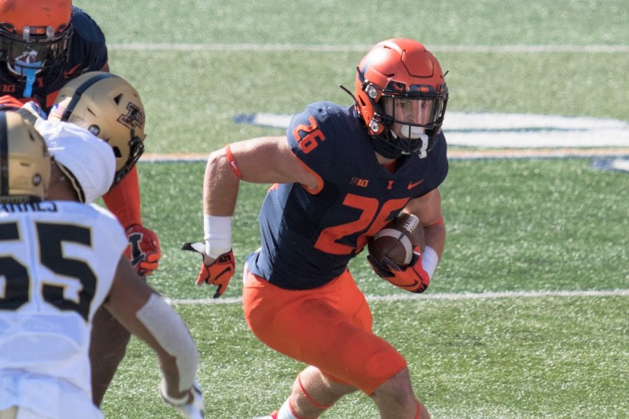 Illinois running back Mike Epstein searches for an opening during the game against Purdue on Saturday. The Illini fell to the Boilermakers 31-24.