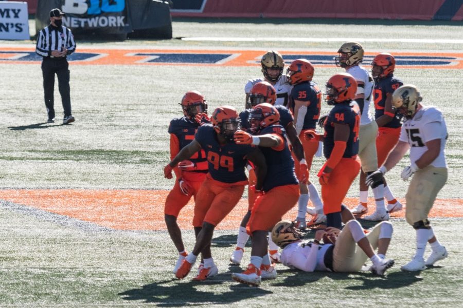 Illinois defensive lineman Owen Carney Jr. celebrates a sack during the game against Purdue on Oct. 31. The Illini fell to the Boilermakers 31-24.