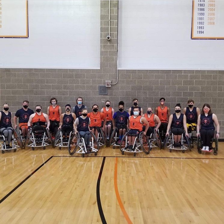 The Illinois wheelchair basketball teams pose for a group photo. The program recently received a grant of $1.5 million to redesign their wheelchairs.