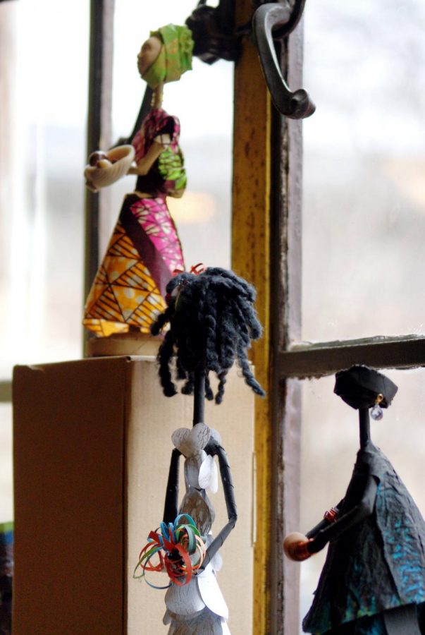 Ja Nelle Davenport-Pleasures dolls made from recycled material sit on display at Café Paradiso on May 3, 2019.