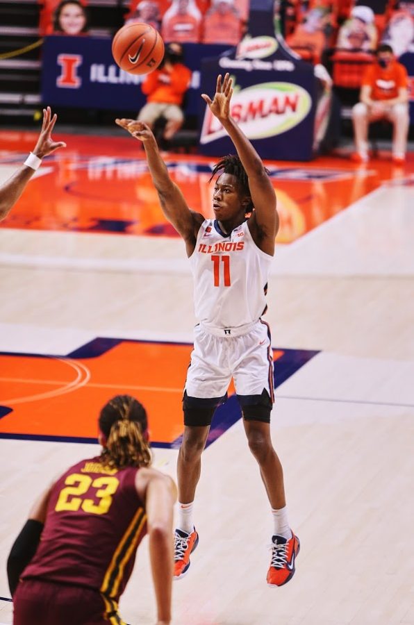 Junior Ayo Dosunmu shoots the ball during the game against Minnesota on Dec. 15. The Illini earned a road win against Penn State on Wednesday with a 98-81 score line.