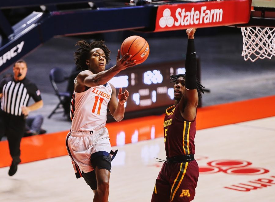 Junior Ayo Dosunmu goes for a layup during the game against Minnesota on Tuesday.