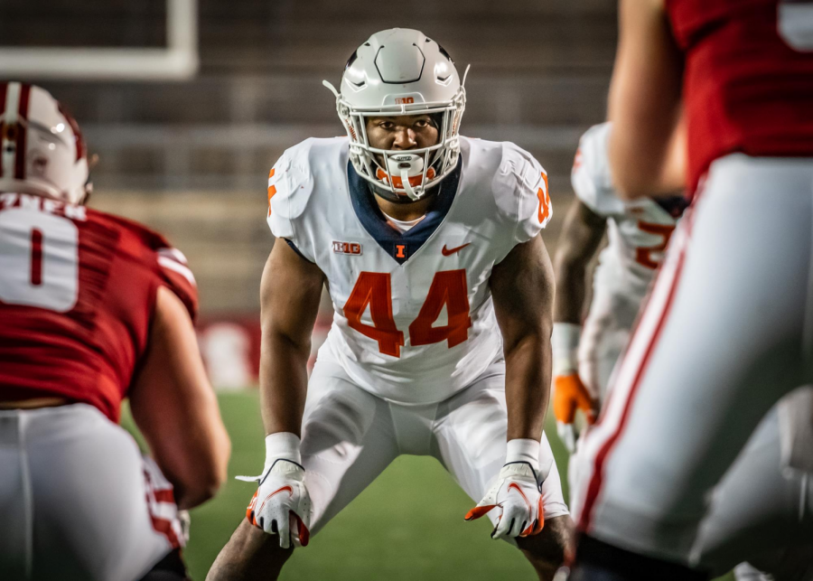 Sophomore Tarique Barnes looks forward as he stands on the line of scrimmage during the game against Wisconsin on Oct. 23. The Illini lost 45-7.