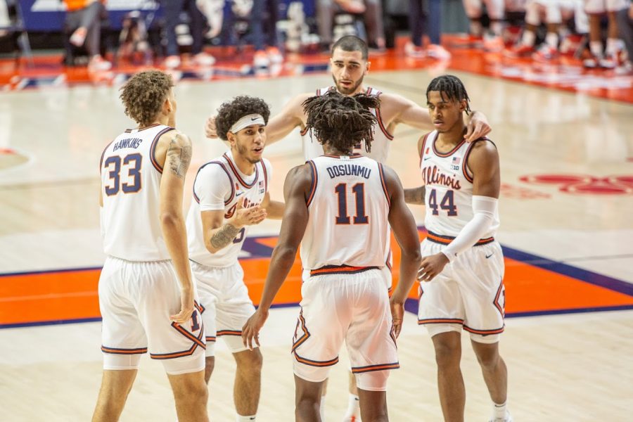 The+Illinois+mens+basketball+team+huddles+before+a+play+during+the+game+against+Purdue+on+Jan.+2.