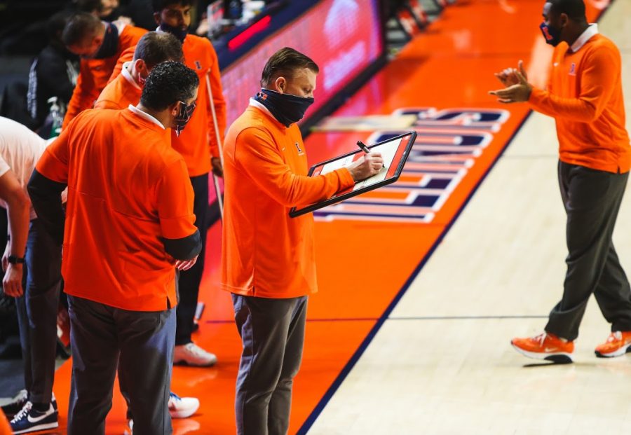 Illinois coach Brad Underwood plans a play on the sidelines during the game against Purdue on Jan. 2.