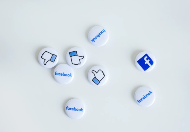 Various buttons depict different Facebook symbols.