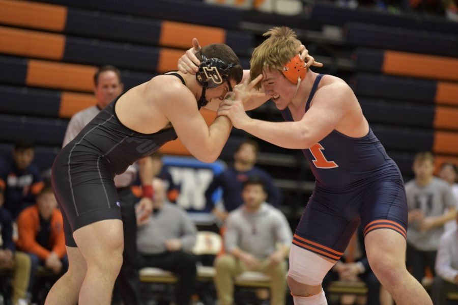 Luke+Luffman+grapples+with+his+opponent+during+the+meet+against+Purdue+on+Feb.+16%2C+2020.+Illinois+will+face+off+against+Purdue+again+today+at+Huff+Hall.