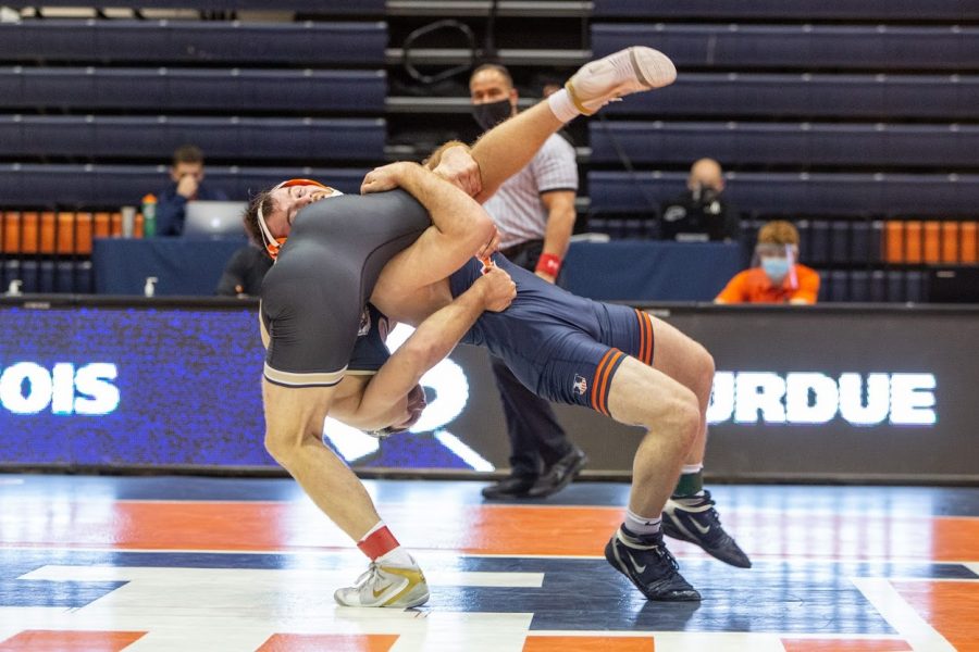 Sophomore+Zac+Braunagel+works+to+flip+his+opponent++during+the+meet+against+Purdue+on+Jan.+22.+The+Illini+will+face+off+against+Minnesota+tonight+in+Minneapolis.