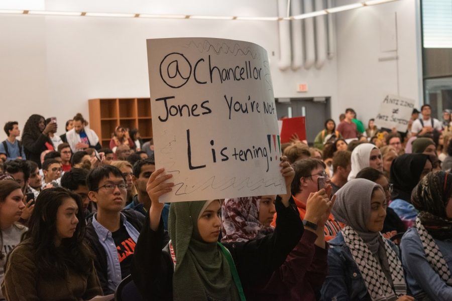 Members of the Students for Justice in Palestine organization protest during the Illinois Student Government Meeting at the ARC Multi-Purpose Room on October 23, 2019. A lawsuit between Speech First and the University was settled on Feb. 2.