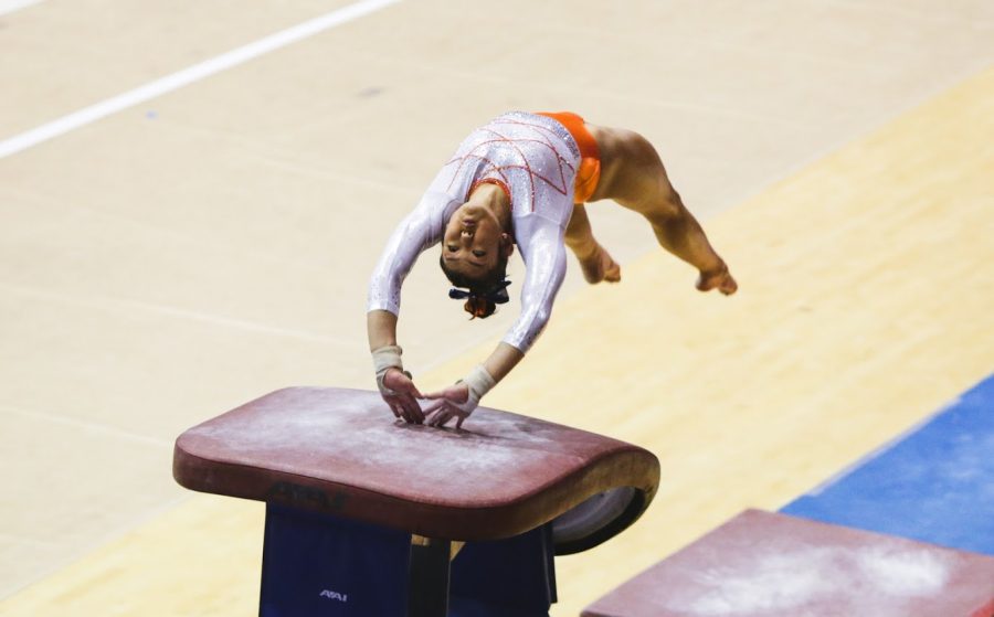Sophomore Mia Takekawa competes in the vault event during the meet against Iowa on Jan. 31. The Illini are set to face off against Penn State tomorrow in University Park, Pennsylvania.