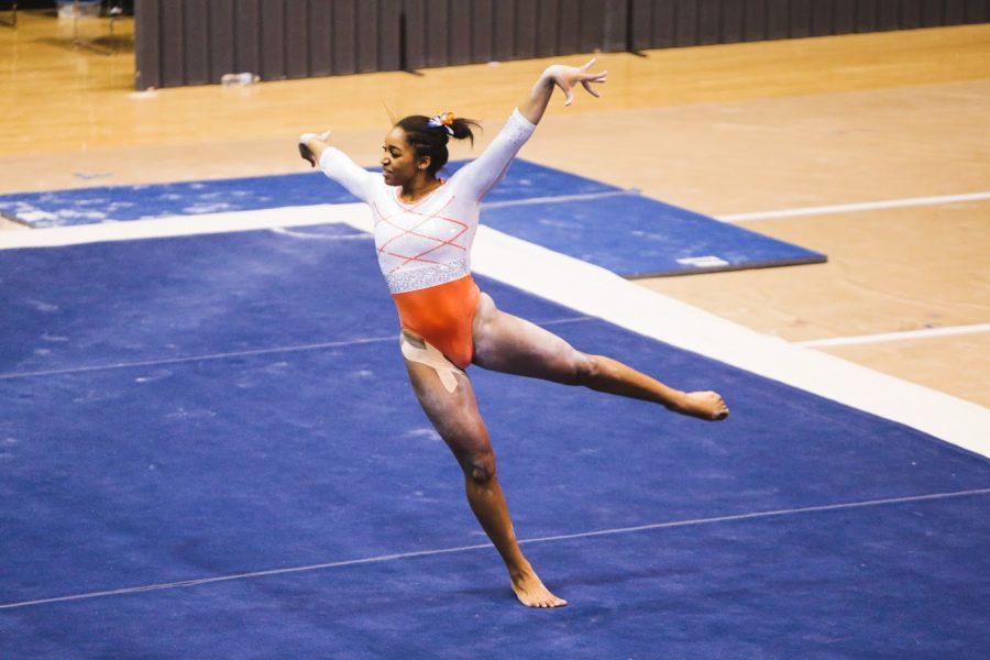 Junior+Shaylah+Scott+performs+her+floor+exercise+routine+during+the+meet+against+Iowa+on+Jan.+31.+The+Illini+will+face+Michigan+at+Huff+Hall+today.