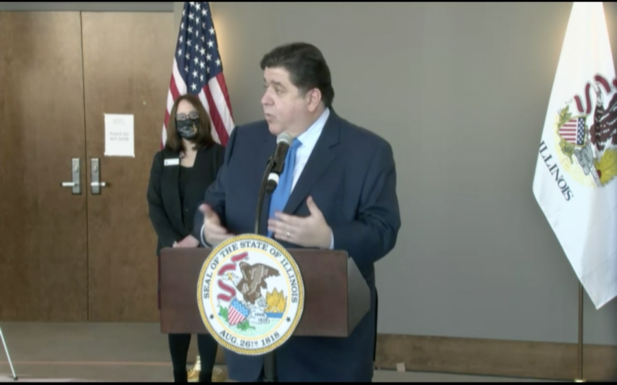 Gov. J.B. Pritzker delivers his remarks after touring the iHotel vaccination clinic in Champaign County. Pritzker, along with several local government and health officials, updated the press on coronavirus news on Wednesday, Feb. 3. 