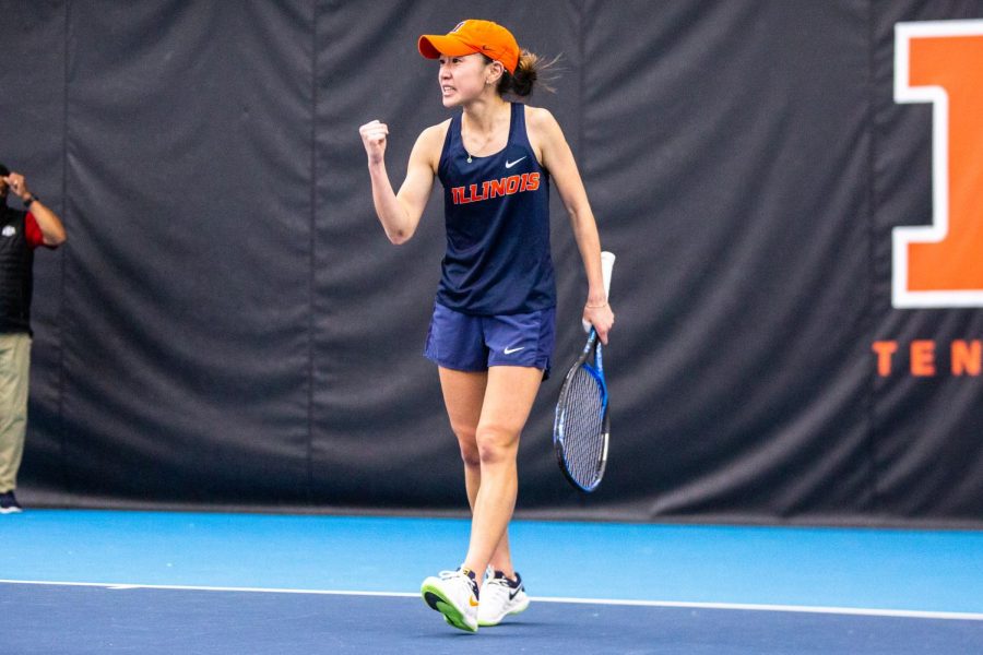 Senior Emilee Duong celebrates after winning a point against Wisconsin on Feb. 26. The Illinois women’s tennis team defeated Indiana and Purdue this weekend at Atkins Tennis Center.