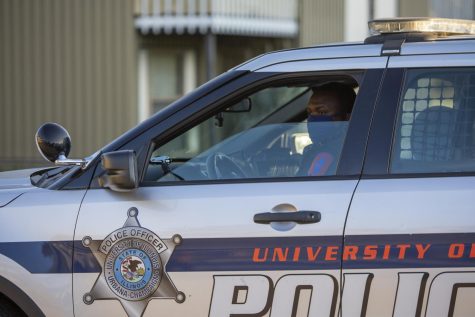 A University police officer pulls away from a scene after responding to a call on Oct. 8, 2021.
