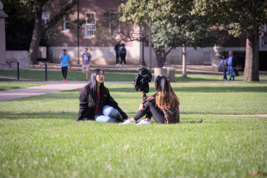 A pair of students enjoy the weather on the Main Quad on Oct. 18, 2019. The Student Affairs Wellness Committee is hosting multiple activities in the coming days for Wellness Week.
