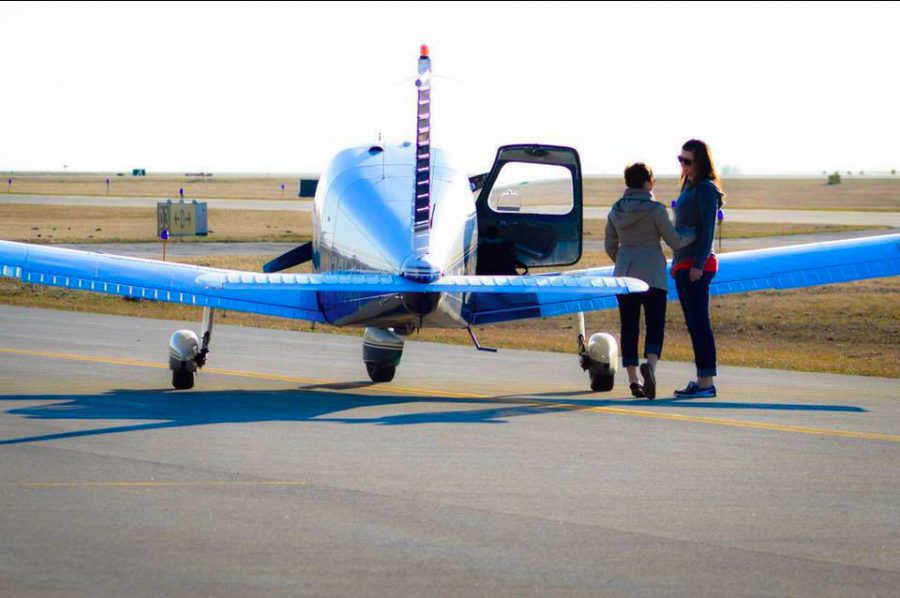 Tara Hurless proposes to her wife in front of a small propeller plane in 2015. Hurless’s life has been a series of twists and turns that have shaped her into the woman she is today. 