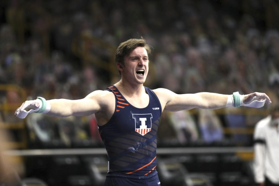 Danny Graham celebrates after a his routine on the rings during a meet against Iowa on Feb. 13, 2021. Graham recently received the Nissen-Emery award, which is the most distinguished award in college gymnastics. 