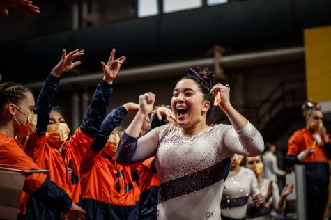 Senior Kylie Noonan celebrates during the Big Ten Womens Gymnastics Championships on Saturday. The Fighting Illini tied with Iowa for third place and finished with 196.625 points.