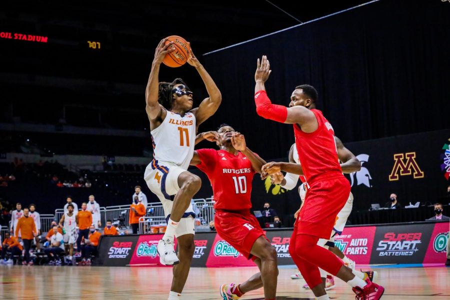 Junior+guard+Ayo+Dosunmu+drives+toward+the+basket+in+the+first+half+of+the+game+against+Rutgers+at+Lucas+Oil+Stadium+on+March+12.+The+Illini+advanced+to+the+semifinals+of+the+Big+Ten+Tournament+for+the+first+time+since+2010+with+a+90-68+win+over+the+Scarlet+Knights.