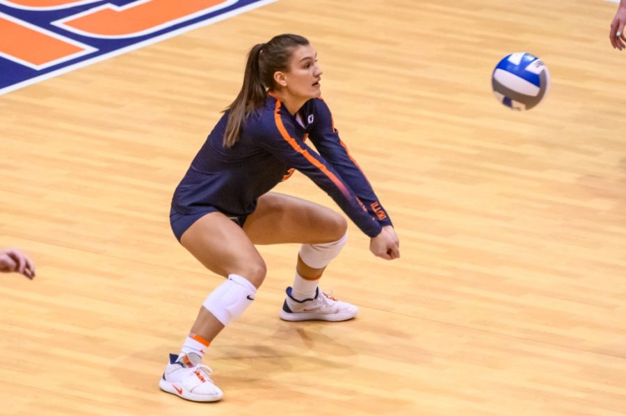 Junior Taylor Kuper bumps the ball during the game against Ohio State on Feb. 19. Illinois will face Nebraska twice this weekend.