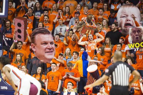 The Orange Krush student section shouts at a game between the Illini men’s basketball team and Minnesota at State Farm Center Jan. 30, 2020.