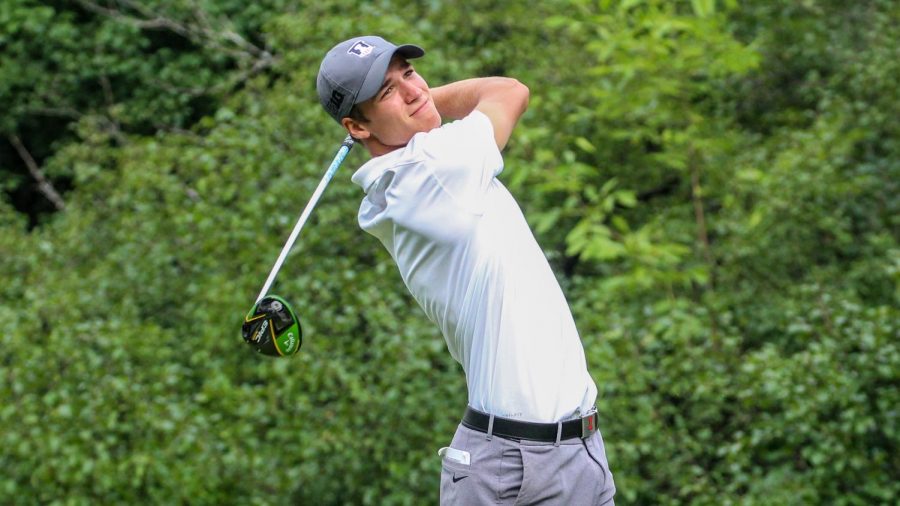 Junior Adrien Dumont de Chassart swings his club on a golf course. The Illinois mens golf team will play in the regular-season finale in Columbus, Ohio this weekend.