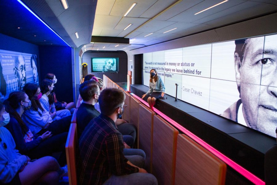 University students listen to speakers in the Mobile Museum of Tolerance on April 12.