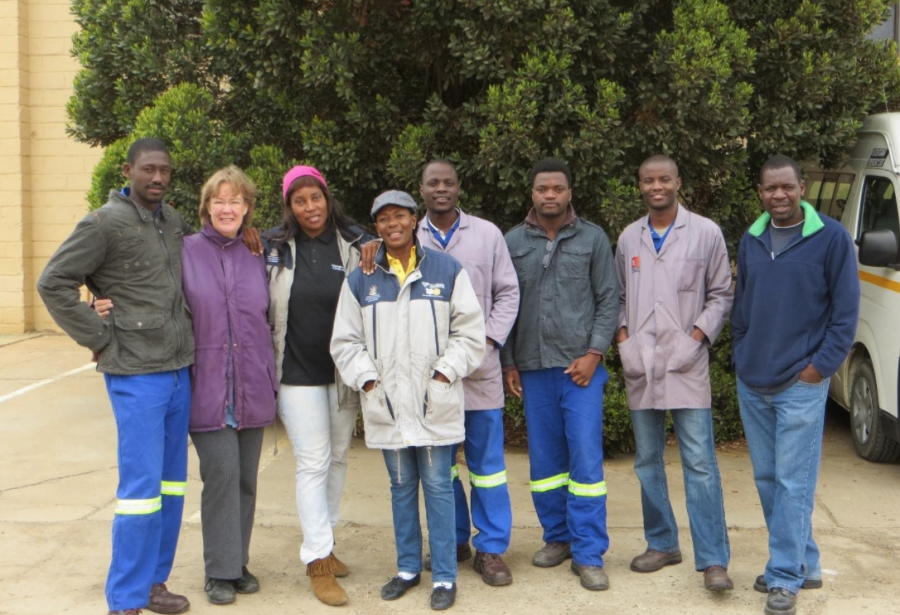 The team of technicians and curators from the National Museum of Namibia and archaeologists from the University of Cape Town: (L-R) Dawid Kapule, Judith Sealy, Nzila M. Libanda-Mubusisi, Fouzy Kambombo, Virimuje Kahuure, Eliot Mowa, Henry Nakale and Shadreck Chirikure pose for a photo. 