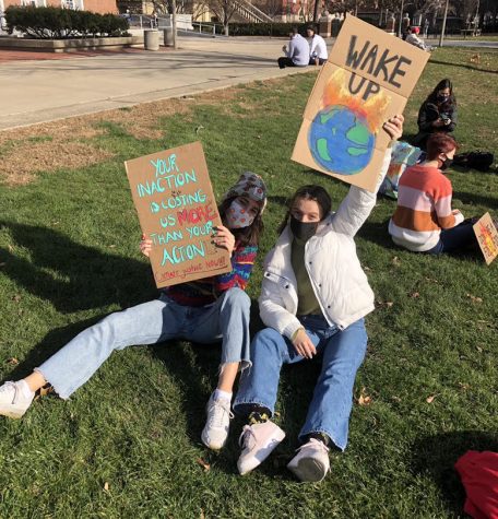 Shallon Malfeo and Nicole Muczynska pose for a photo at the SECS Climate Strike last fall. The Universities Students For Environmental Concerns group will host Earth Week events from April 17 to April 23.