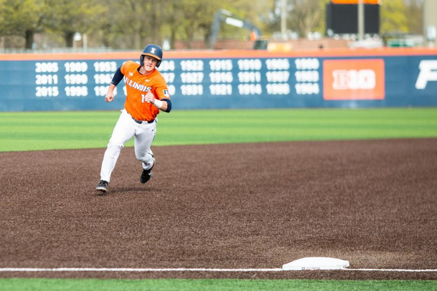 Senior+Jackson+Raper+rounds+second+base+and+attempts+to+reach+third+during+the+game+against+Purdue.+The+Illinois+baseball+team+closed+out+their+final+homestand+with+a+series+win+over+Penn+State.