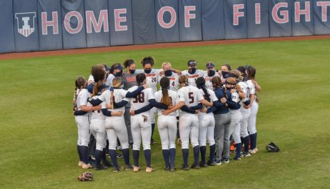The Illini softball team huddles around after their game against Purdue on April 16. The teams regular season has now come to an end.