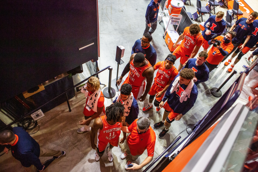 The Illinois men's basketball team exits the court after the game against Iowa at State Farm Center Jan. 29. As the team just lost two assistants coaches to Kentucky, Chester Frazier is hired to take their place.