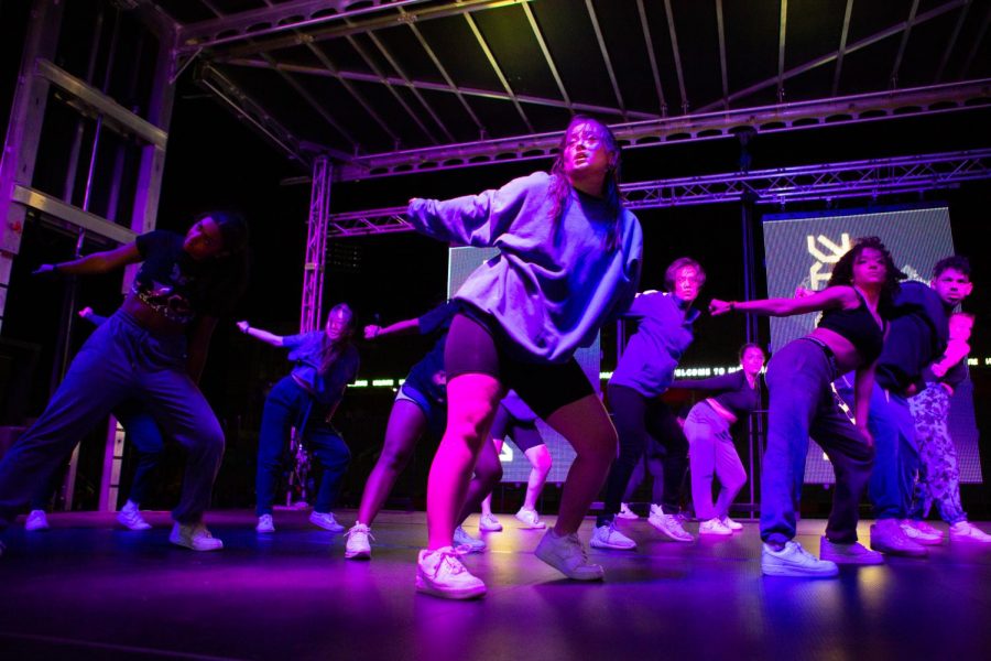 Members of the group Dance2XS UIUC performs a move onstage at the URBANITE Dance Showcase May 1.