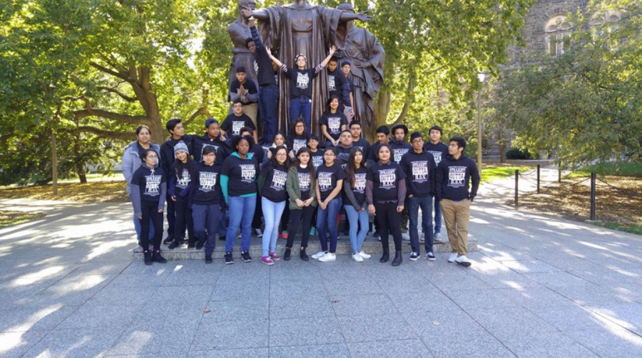 The Universities Society of Hispanic Professional Engineers poses for a photo in front of Alma Mater in Urbana. Their outreach program prepares young Latinx students who want to apply to and attend the University.