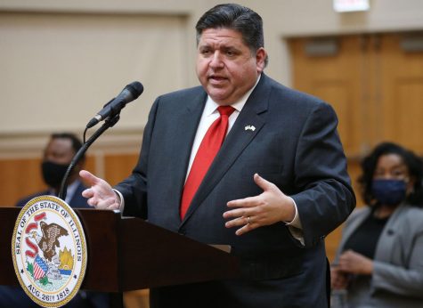 Gov. JB Pritzker answers questions at a news conference on March 26, 2021. 