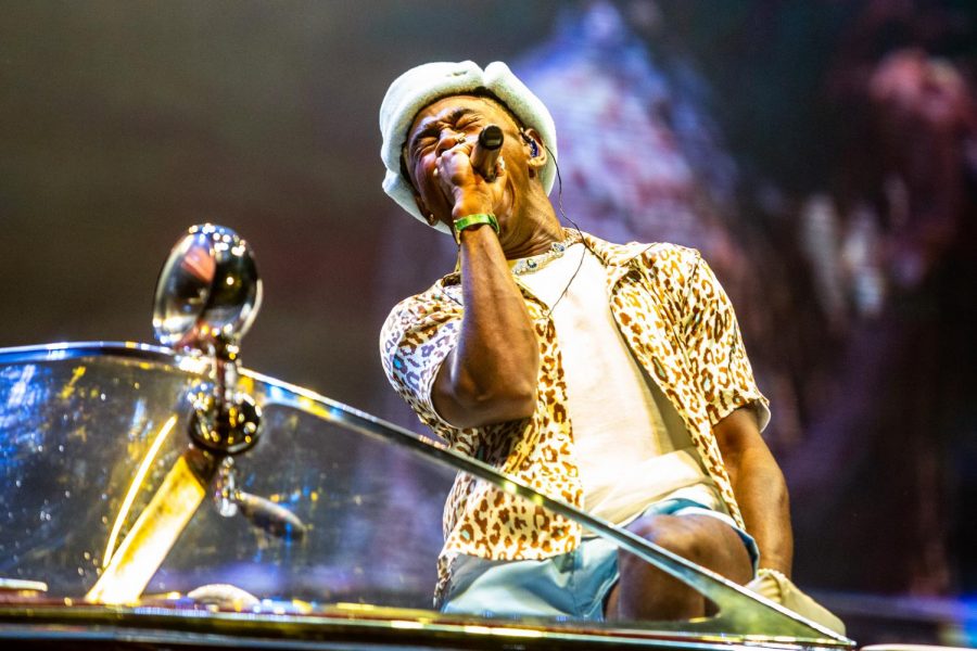 Rapper Tyler, the Creator performs on the T-Mobile stage while sitting in a boat at Lollapalooza on July 30.