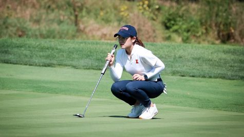 Senior Crystal Wang looks for her next move on the putting green during the Schooner Fall Classic. The team finished in a tie for fourth with Florida State.