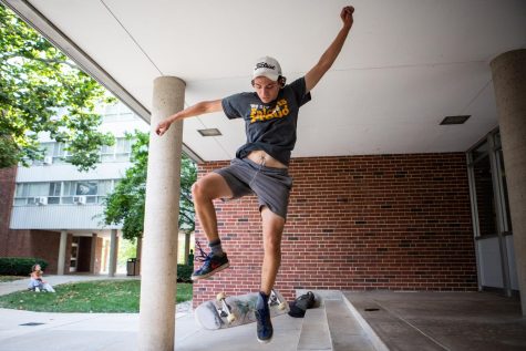 Griff Ahnert, an Engineering major living at Lincoln Avenue Residence Hall, skates outside of Weston Hall on Sept. 18. Students react to increased University housing rates in the new academic year.