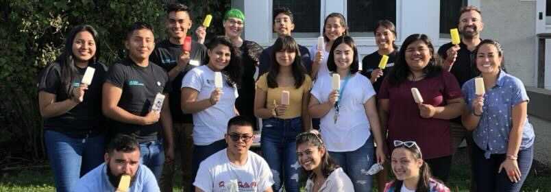 A photo is taken during La Casa Cultural Latinas annual Paleta social to welcome new students. Senior Cristal Caballero is in the second row, third from the left.
