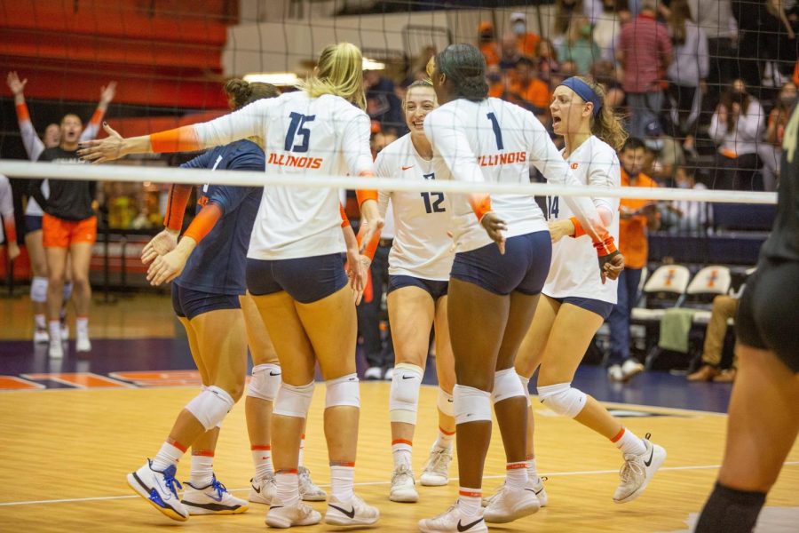 Illinois celebrates during the match against Purdue on Oct. 6. The Illini beat the Iowa Hawkeyes in straight sets on Wednesday to snap the teams three-match losing streak. 