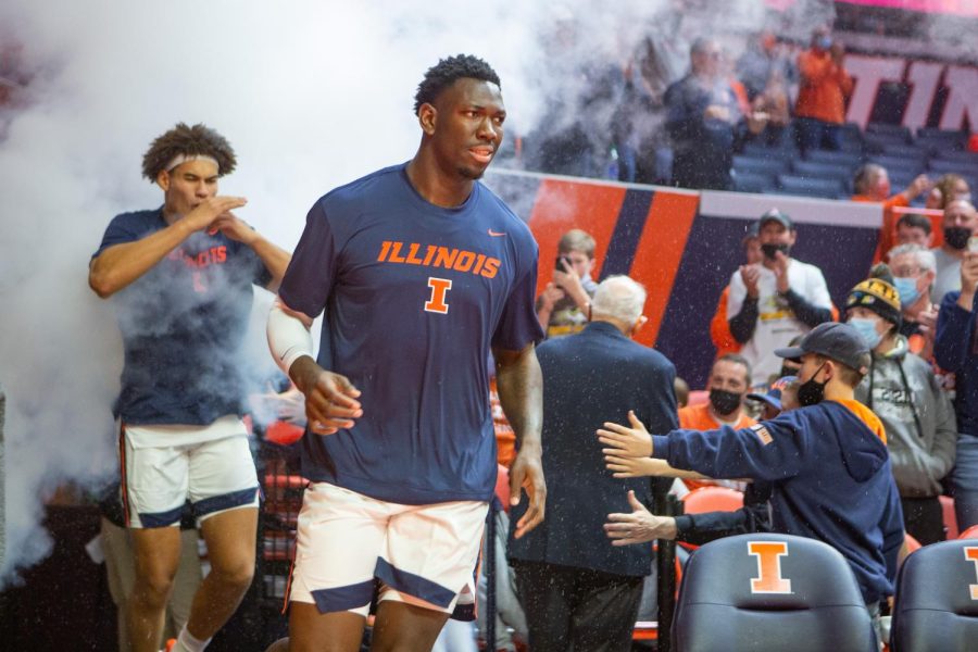 Center Kofi Cockburn walks out onto the court at State Farm Center before the St. Francis game on Saturday. Cockburn was voted Big Ten Preseason Player of the Year.  